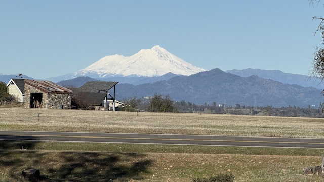 view of mountain feature featuring a rural view