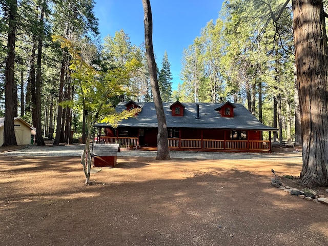 view of front facade featuring an outbuilding