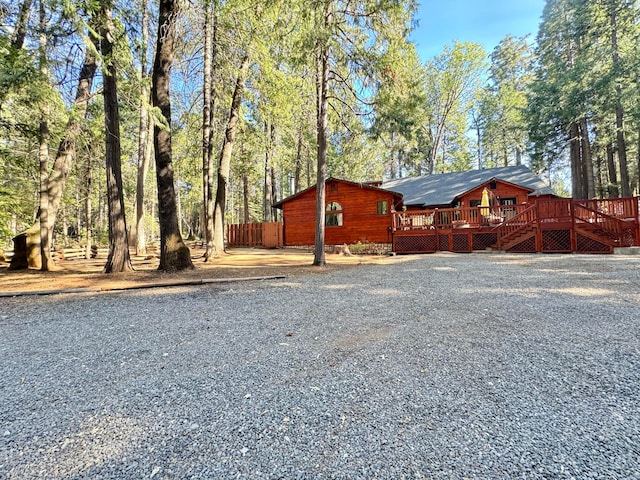 exterior space featuring a wooden deck