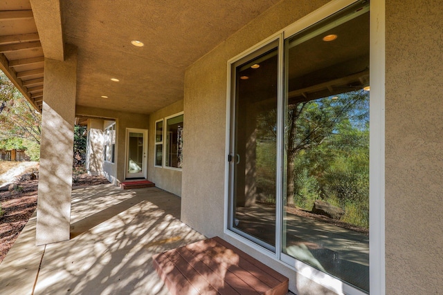 wooden deck featuring a patio area