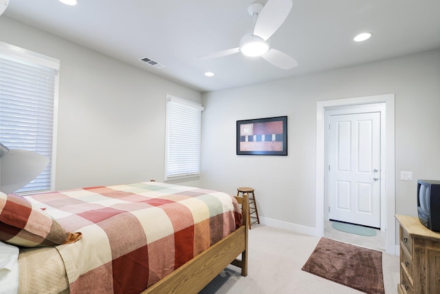 carpeted bedroom with ceiling fan