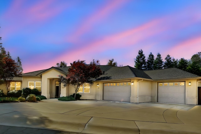 view of front of property with a garage