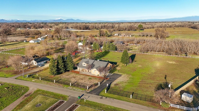 aerial view featuring a mountain view and a rural view