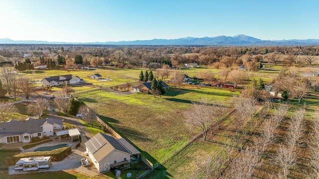 bird's eye view featuring a mountain view and a rural view