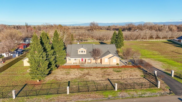 birds eye view of property with a rural view