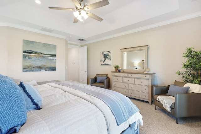 bedroom featuring a raised ceiling, ceiling fan, light carpet, and ornamental molding