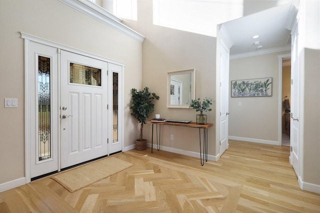 entryway with ornamental molding and light parquet flooring