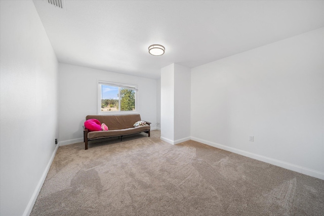 sitting room with light carpet