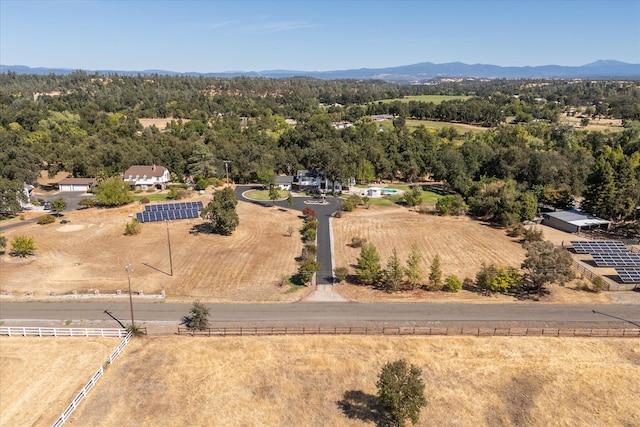 birds eye view of property with a rural view and a mountain view