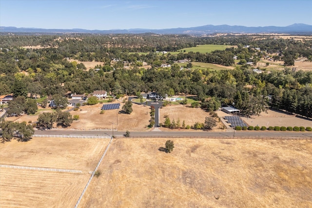 drone / aerial view featuring a mountain view