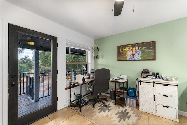 tiled home office with ceiling fan