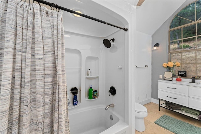 full bathroom featuring shower / tub combo with curtain, vanity, toilet, and tile patterned flooring