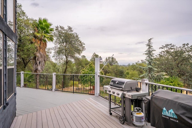 wooden terrace with grilling area