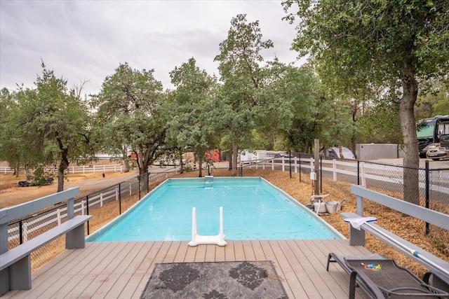 view of pool featuring a wooden deck