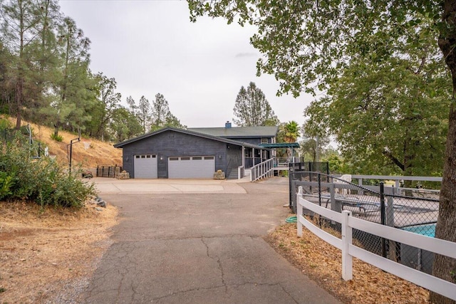 view of front of home featuring a garage