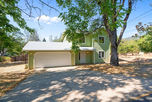 view of front of home with a garage