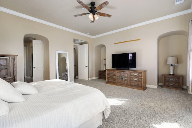 bedroom featuring ceiling fan, light carpet, and crown molding