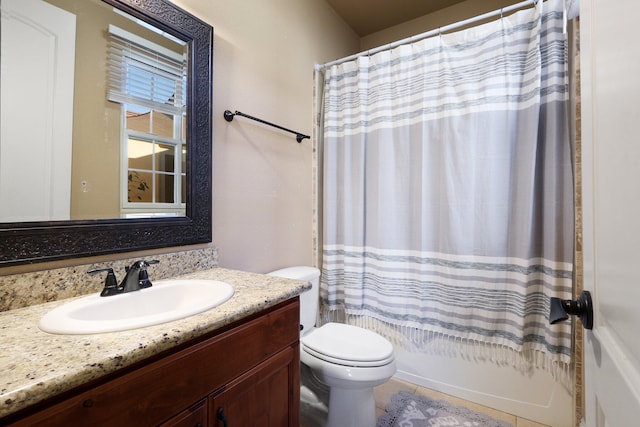 full bathroom with shower / tub combo with curtain, tile patterned floors, vanity, and toilet