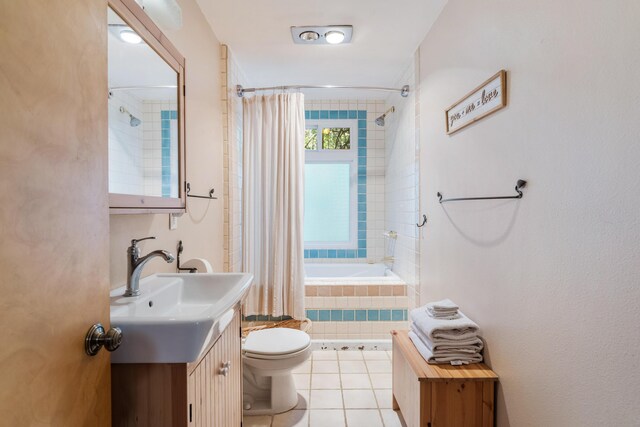 30570 Sleepy Hollow Dr, Shingletown, CA 96088 - full bathroom featuring tiled shower / bath combo, vanity, and tile patterned flooring