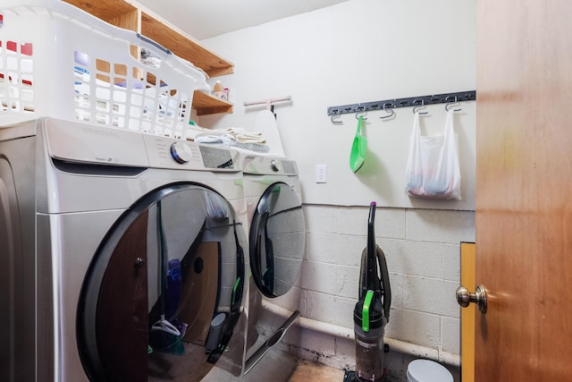 30570 Sleepy Hollow Dr, Shingletown, CA 96088 - washroom with independent washer and dryer and concrete block wall
