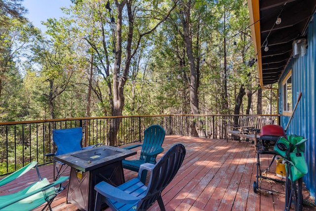 30570 Sleepy Hollow Dr, Shingletown, CA 96088 - wooden terrace with a fire pit