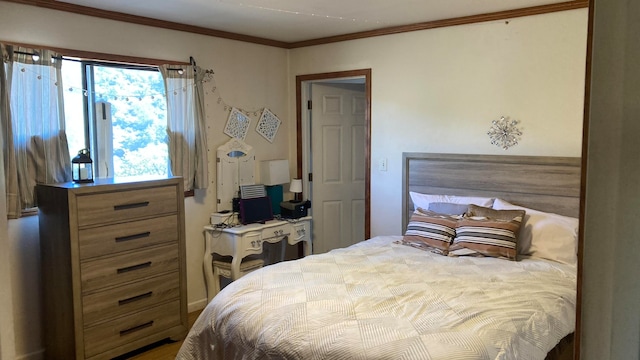 bedroom featuring crown molding