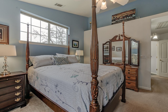 bedroom featuring ceiling fan and light colored carpet