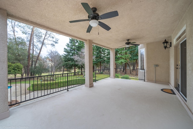 view of patio / terrace featuring ceiling fan and a balcony