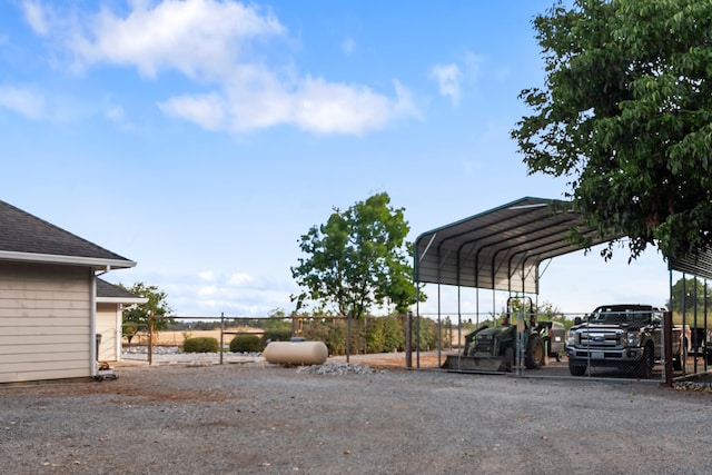 view of car parking featuring a carport