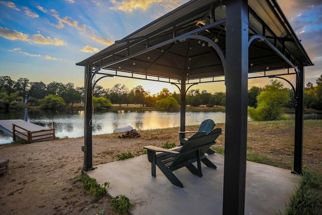 exterior space with a gazebo and a water view