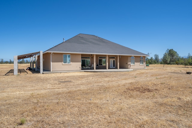 rear view of house with a patio area