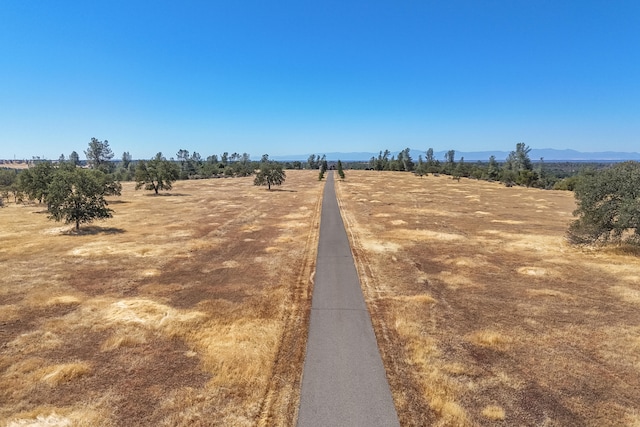 view of road featuring a rural view