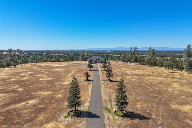 drone / aerial view with a rural view and a mountain view