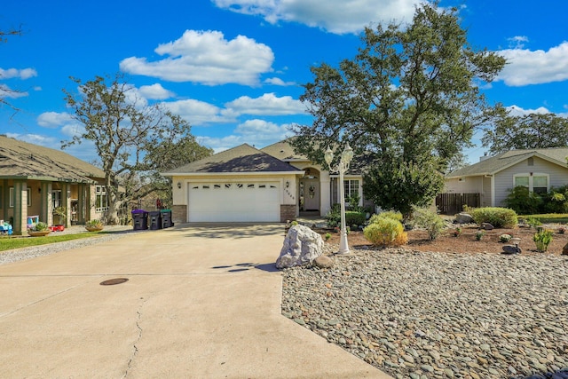 ranch-style house featuring a garage