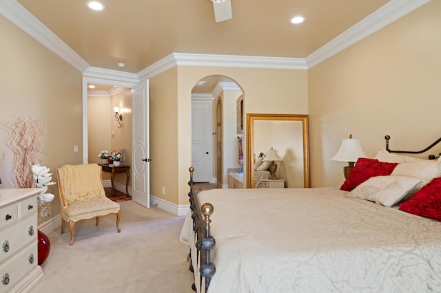 bedroom featuring crown molding, ceiling fan, and light colored carpet