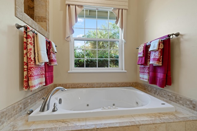 bathroom with a relaxing tiled tub