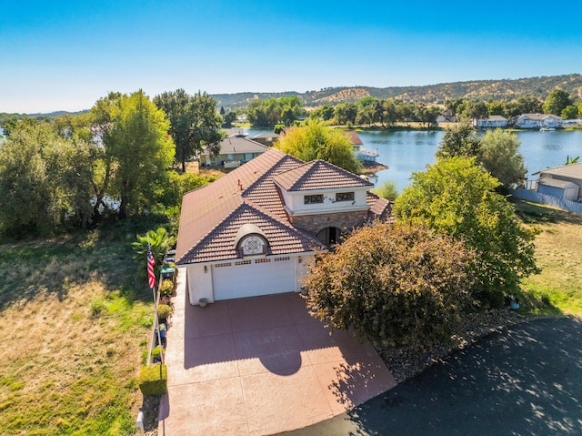 aerial view featuring a water view