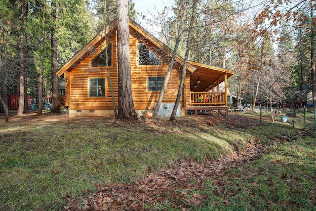 view of property exterior featuring a yard