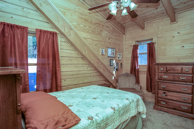 bedroom featuring wooden ceiling, vaulted ceiling with beams, wood walls, and ceiling fan