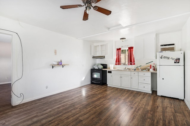 kitchen with dark wood-type flooring, white cabinets, white fridge, and black range with electric cooktop