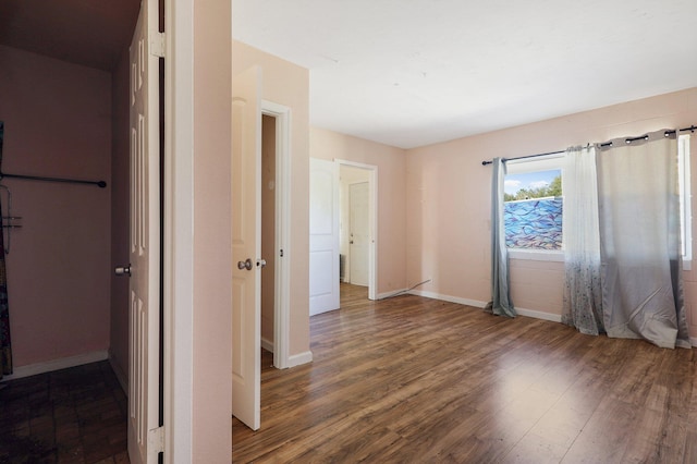 interior space with dark wood-type flooring