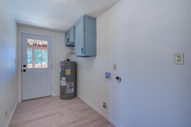 laundry area with cabinets, light hardwood / wood-style floors, hookup for an electric dryer, washer hookup, and water heater