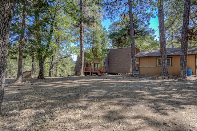 view of yard featuring a deck