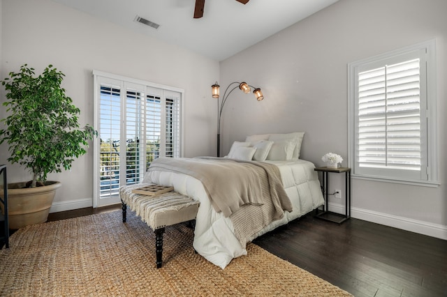 bedroom with dark wood-type flooring, access to exterior, and ceiling fan