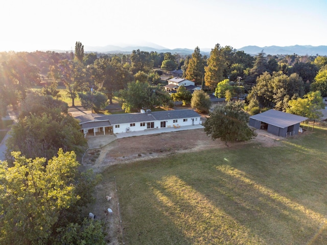 birds eye view of property featuring a mountain view