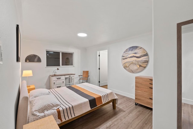 bedroom featuring light wood-type flooring