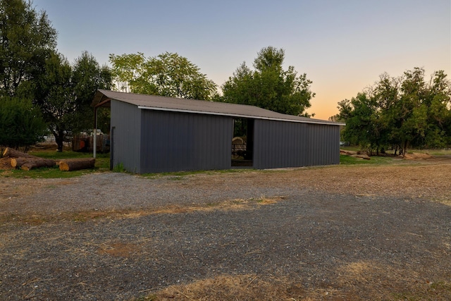 view of outdoor structure at dusk