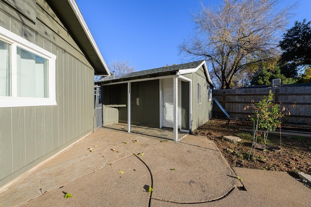 exterior space featuring a storage shed