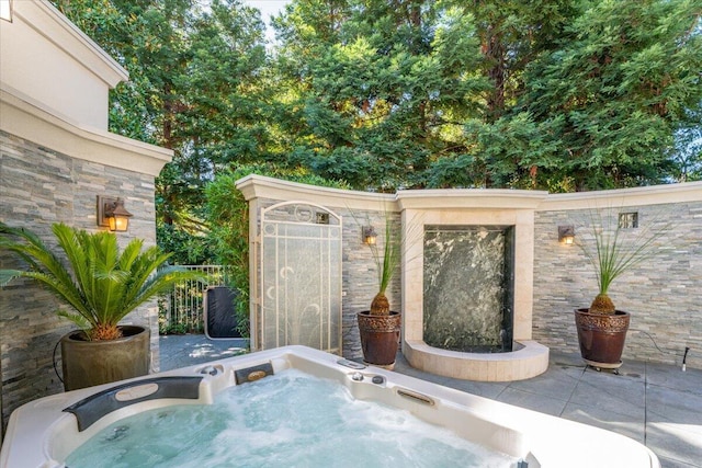 view of patio featuring a hot tub