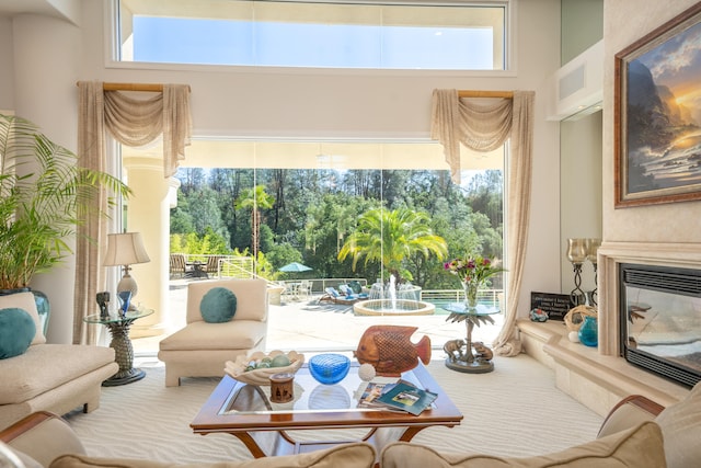 living room with a towering ceiling